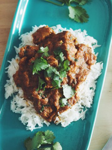 overhead of a plate with rice and vegan butter chicken